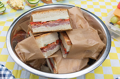 Pressed Italian sandwiches in a bowl