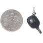 Sterling Silver Pickleball Paddle and Ball Charm 22x9mm next to dime