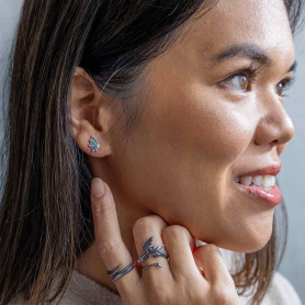 Sterling Silver Dragon Wing Earring and Rings on Model