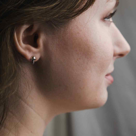 Sterling Silver mushroom post earrings on model