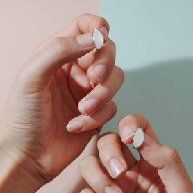 Sterling Silver Large Teardrop Huggie Hoop Earrings 15x8mm in hands