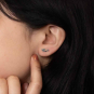 Sterling Silver Tiny Koi Post Earrings 12x6mm on model