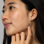 Sterling Silver Fishbone Post Earrings 4x11mm on model