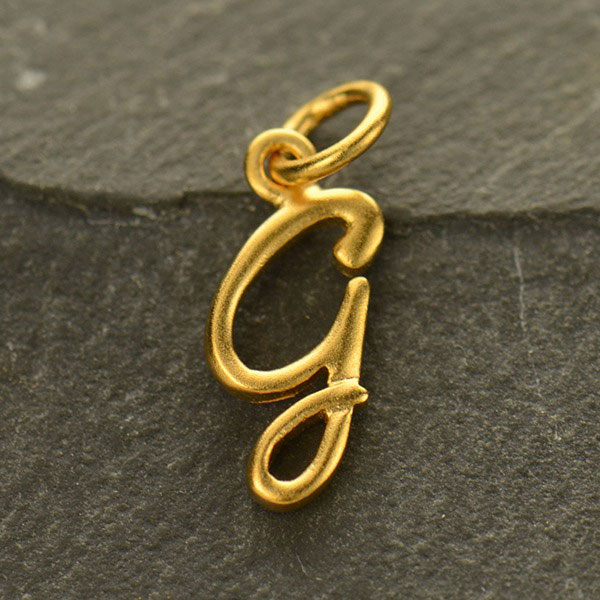 gold chain with initial charms