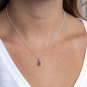 Sterling Silver Mini Skull Charm Necklace on model