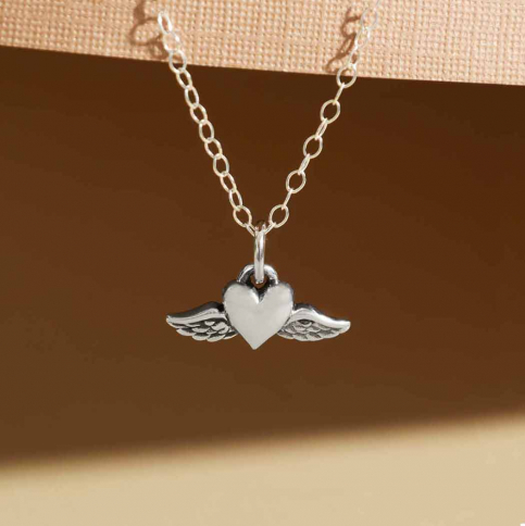 Sterling silver heart necklace with wings