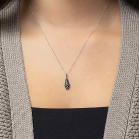 Nina Designs Bat Necklace on Model