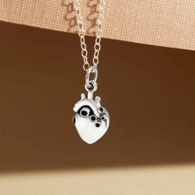 Sterling silver small anatomical heart back  view