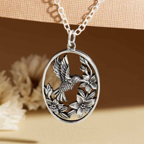 Sterling silver hummingbird and flower necklace