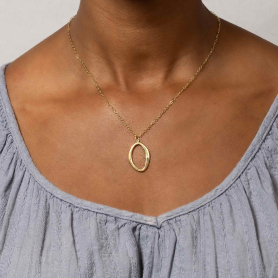 Bronze Asymmetrical Oval Necklace with Gold Fill Chain on model