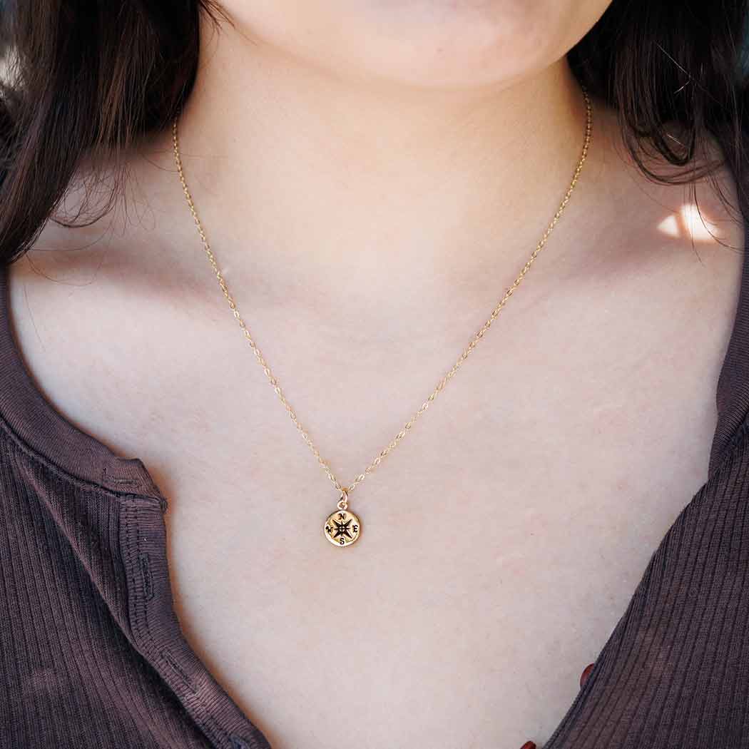 Bronze Compass Necklace on neck