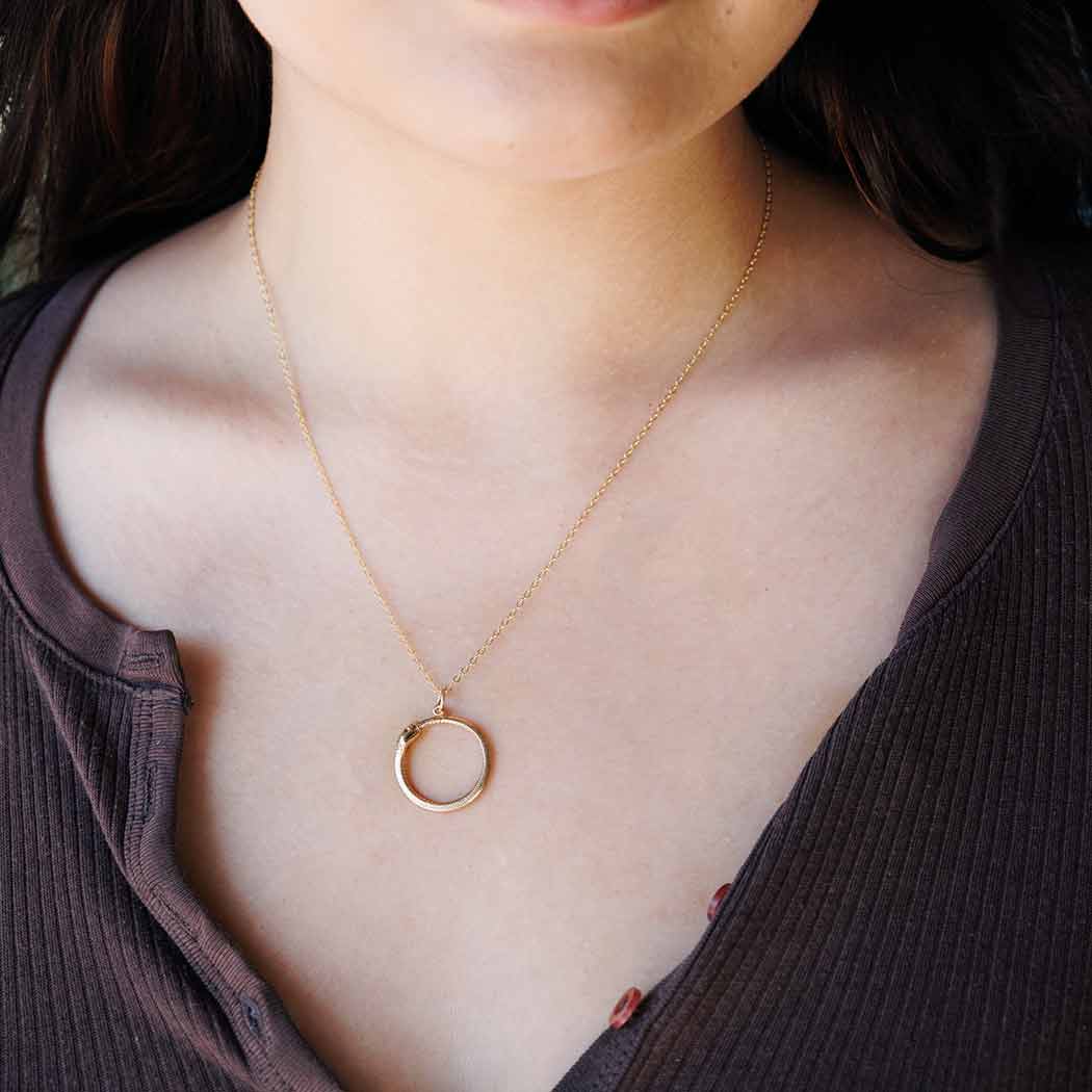 Bronze Ouroboros Necklace on Neck