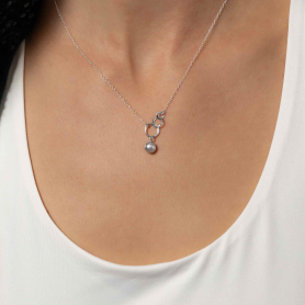 Sterling Silver Circle of Life Necklace with Pearl on model