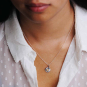 Sterling silver and bronze radiant heart necklace on neck