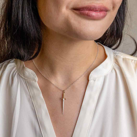 Sterling Silver Sword Necklace with Bronze Handle on model