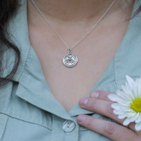 Sterling Silver Wax Seal Moth Necklace on model