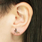 Solid 14K Gold dragonfly earrings on ear