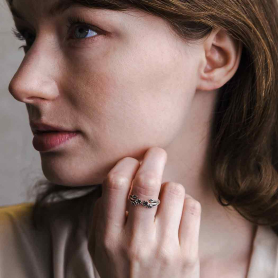 Sterling silver adjustable flower ring on model