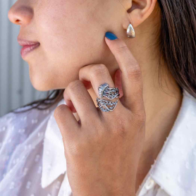 Sterling Silver Adjustable Jellyfish Ring on hand