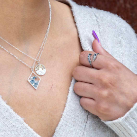 Sterling Silver Adjustable Wave and Shell Ring on hand