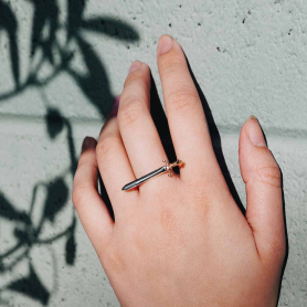 Sterling Silver Sword Ring with Bronze Handle on hand