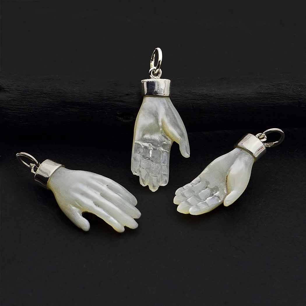 Carved Mother of Pearl Hand Pendant with Silver Bail