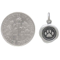 Sterling Silver Paw Print Wax Seal Charm 16x11mm next to dime