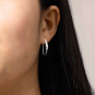 Sterling Silver Hammered Arc Earrings 20x3mm on model
