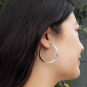 Sterling Silver Hammered Hoop Earrings 40mm on model