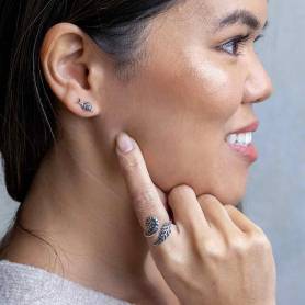 Sterling Silver Tiny Snail Post Earrings on model