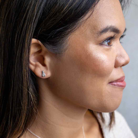 Sterling Silver 3D Ghost Post Earrings on model