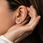 Nina Designs Sterling Silver Tiny Dimensional Frog Post Earrings on model