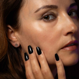 Sterling Silver Small Spiderweb Post Earrings on model