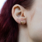 Bronze Lady Bug Post Earrings on ear