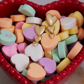Bronze Three Heart Earrings in candy dish