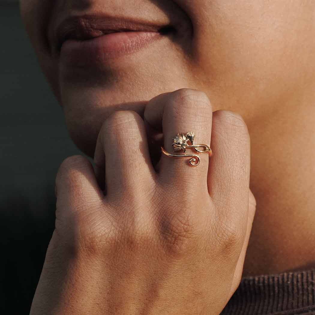 Bronze Adjustable Lotus Ring on hand