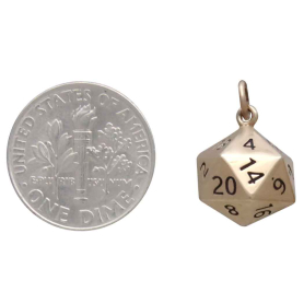 Bronze 10 sided dice next to dime