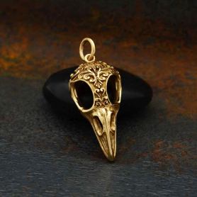 Bronze Raven Skull Charm with Scroll Carving 28x11mm