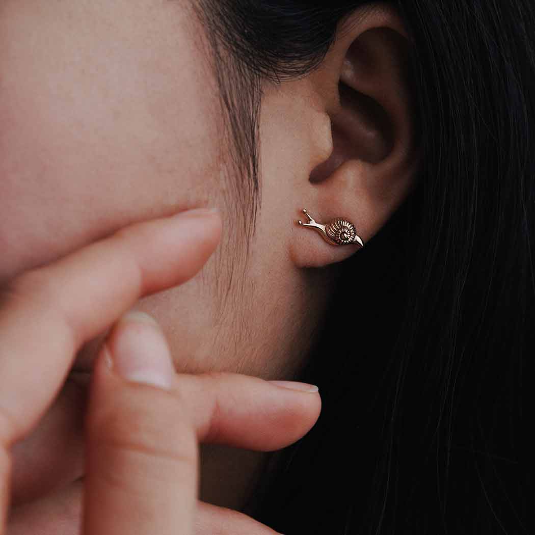 Bronze Tiny Snail Post Earrings 6x14mm on ear