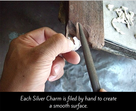 Filing silver charms