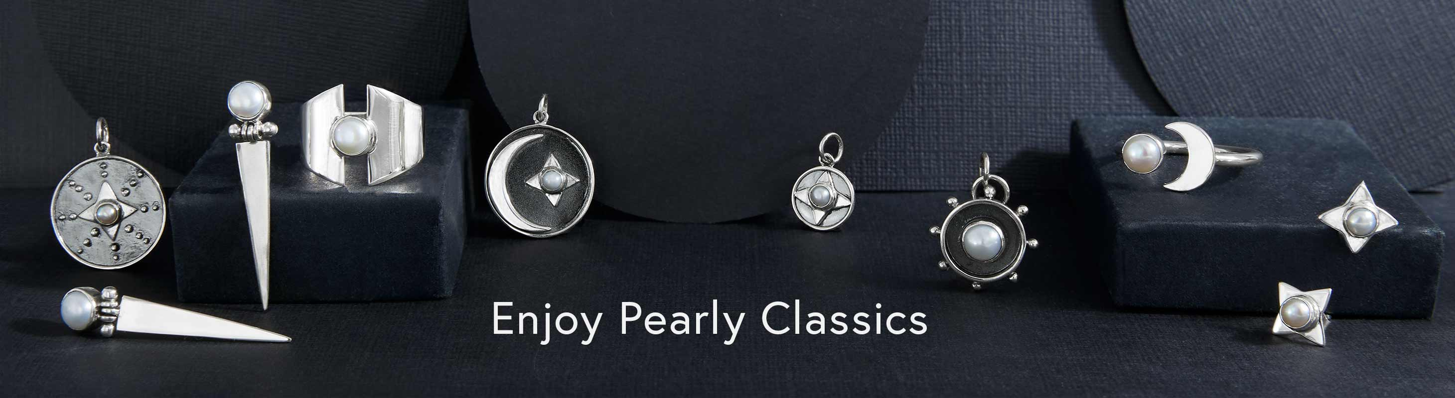 Enjoy pearly classics. Pearl charms, pearl rings and more.