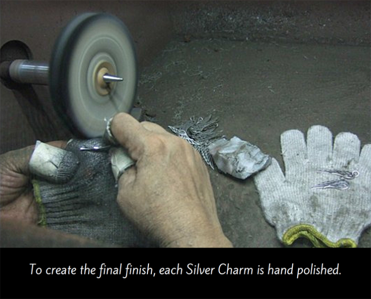 Polishing charms on wheel