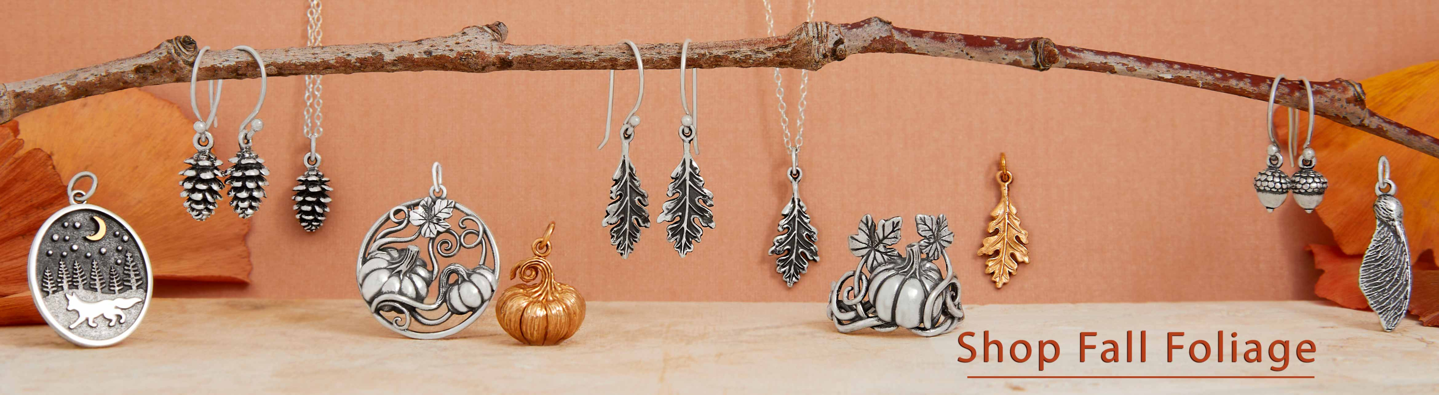 Shop Nina Designs Fall Foliage jewelry collection with pumpkins, pinecones, oak leaves, acorns, and sterling silver charms, necklaces, and earrings