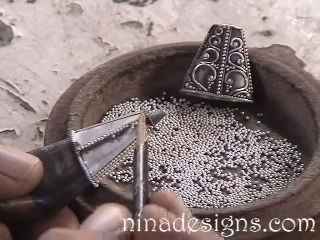 Granulation Balls Being Applied to Cone Component 