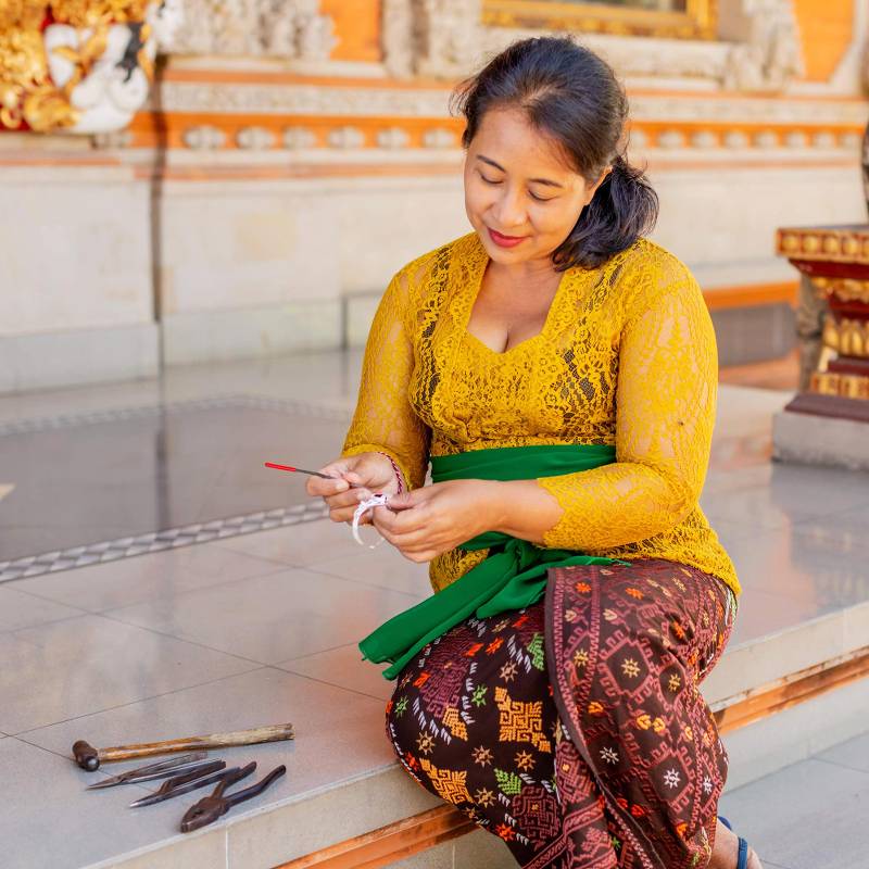 Woman making jewelry