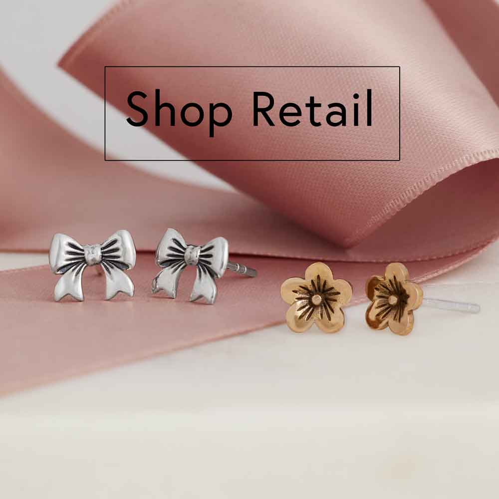 Silver bow earrings and bronze flower earrings