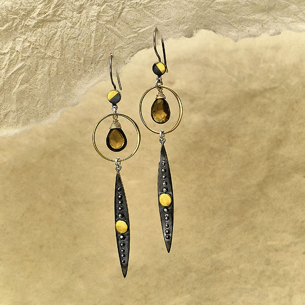 Mixed metal spike earrings design idea