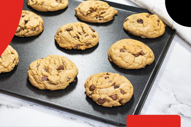 AMT baking sheet with fresh baked chocolate chip cookies