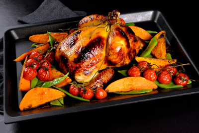 Roasted chicken in an AMT cooking tray
