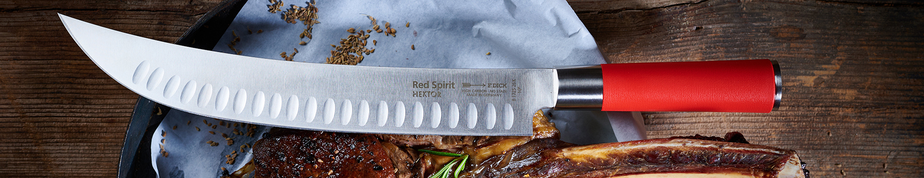 FDick Red Spirit Hektor knife on a wood background